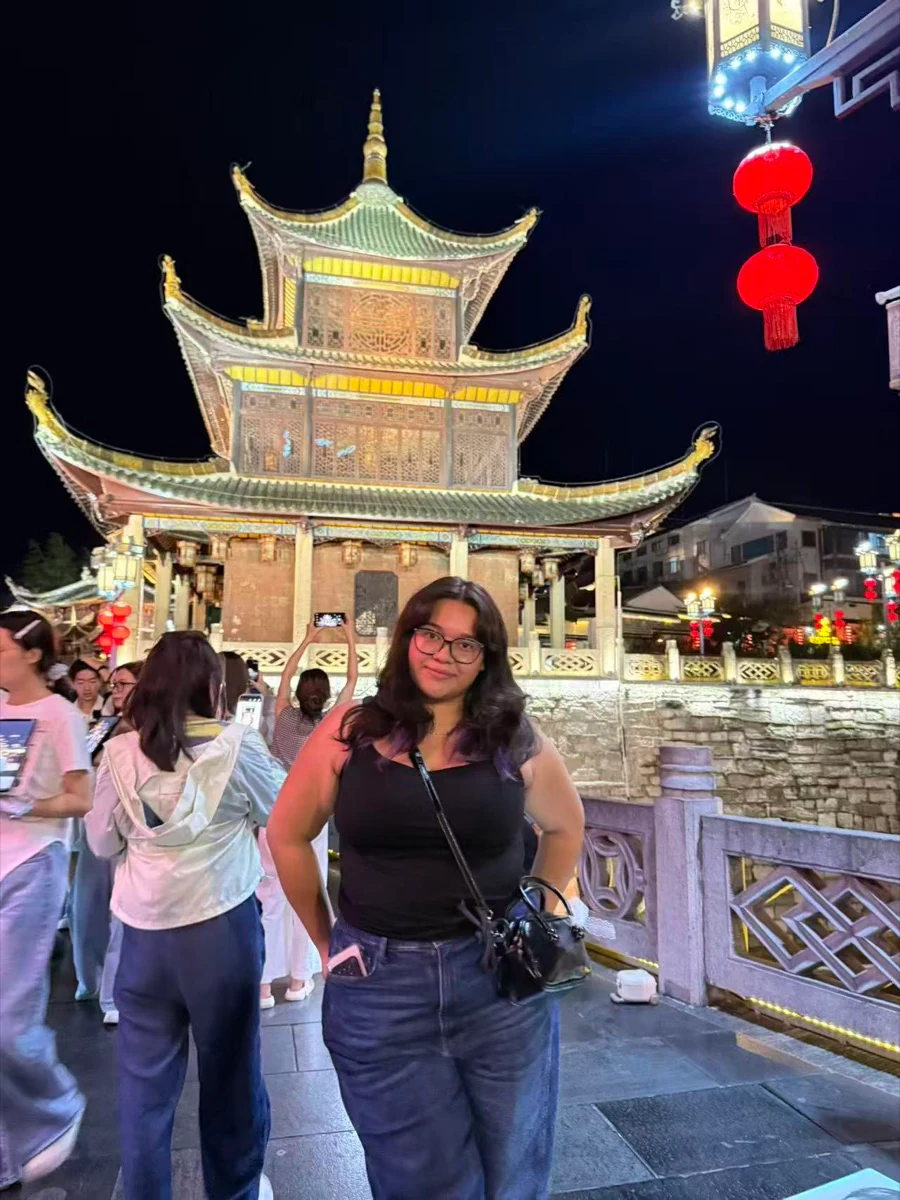 An au pair exploring China while travelling with her host family